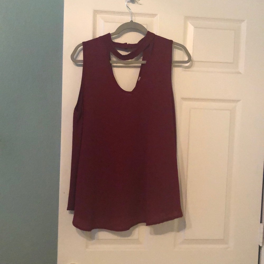 Red sleeveless blouse